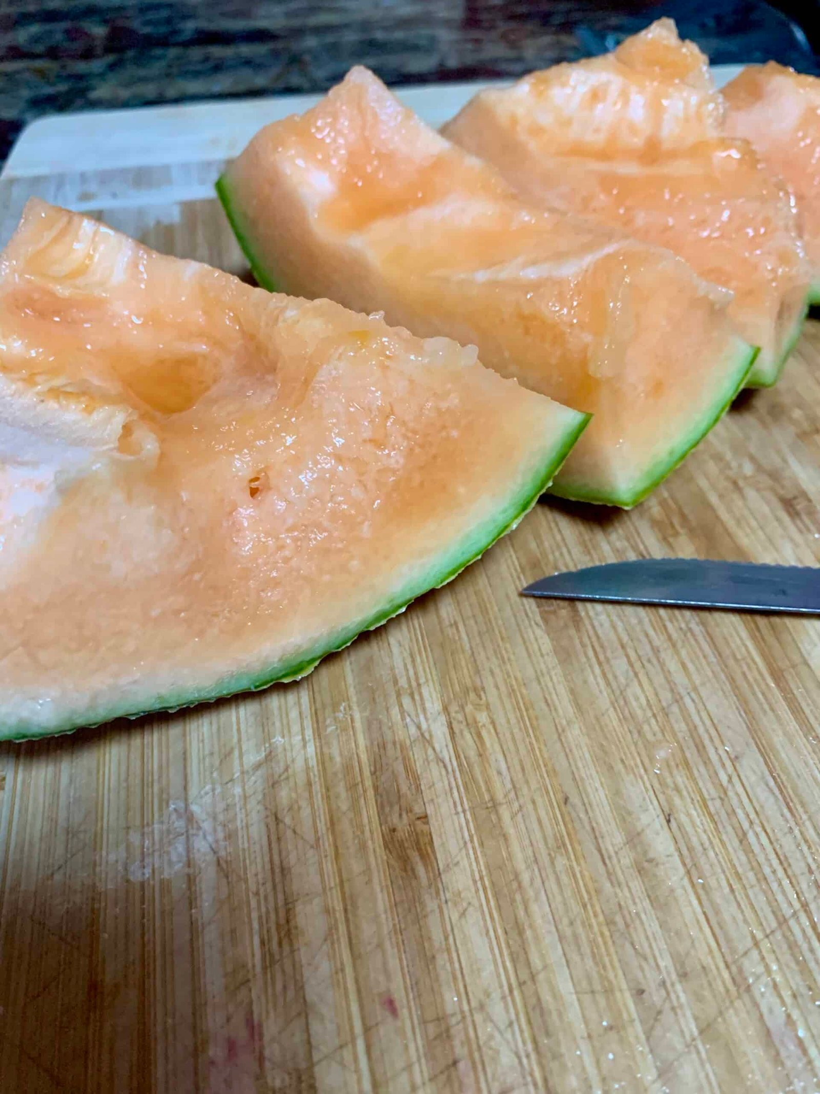 cut open rotting cantaloupe